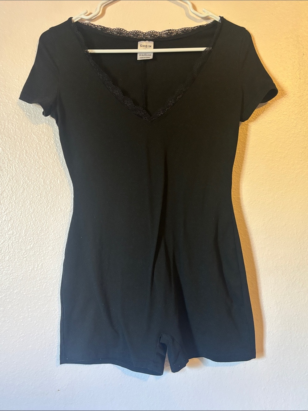 Woman’s Black V Neck Lace Trim Short Romper, Size S